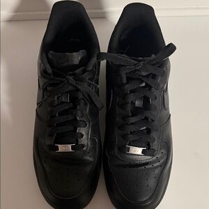 Nike All-Black Leather Low-Top Sneakers